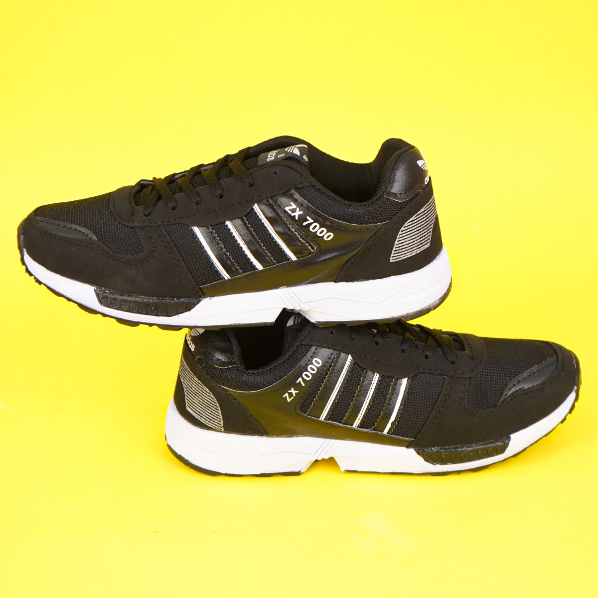 کفش ورزشی مردانه مشکی سفید مدل ZX7000